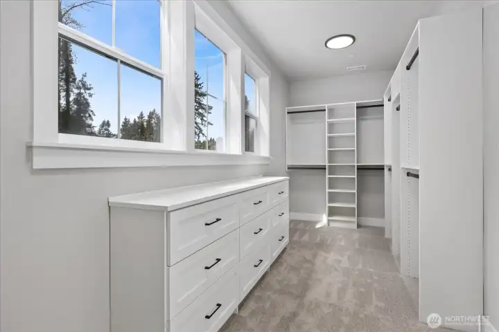 Upper Level Primary Walk-in Closet Upper Level Primary Walk-in Closet