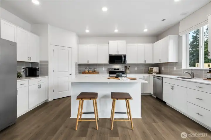 Photo rendering is representational and may be virtually staged. Actual home is under construction and finishes, elevation, and paint colors may vary. See site agent for details.