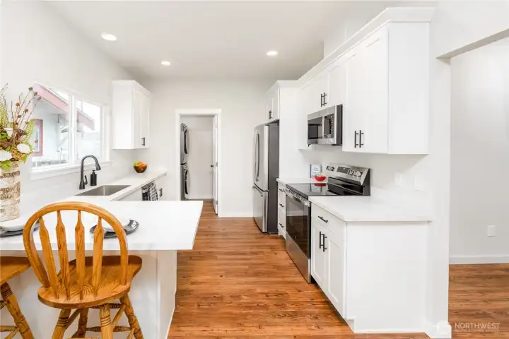 Spacious kitchen with an eating bar. Spacious kitchen with an eating bar.