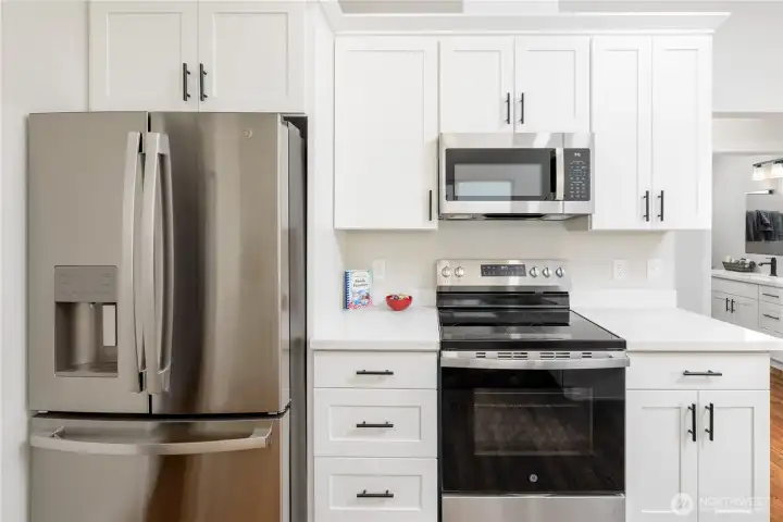 New refrigerator, stove and microwave. New refrigerator, stove and microwave.