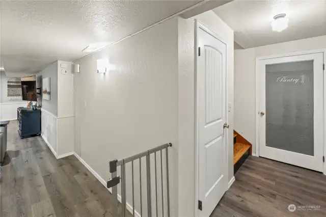 Heading down to the daylight basement, you'll find several storage closets, The large laundry, 2 more bedrooms and the large entertainment room.