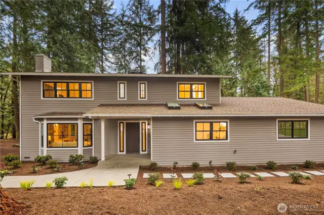 the new walk-ways welcome you home and it's even prettier at night with all new landscape light to brighten up the pathways. Your new home is private and sited on a 1.75 acre property in the heart of Woodinville.