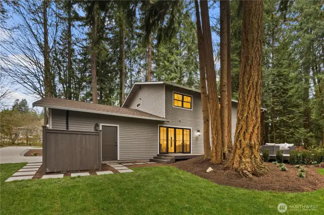 The rear yard has been completely re-done and offers privacy, tons of space , new large deck, and a circular flow from the front to the back yard.
