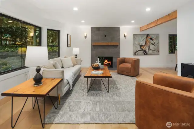 This inviting living space offers fully renovated floors, fireplace, windows and paint...this is a place to gather and make memories!