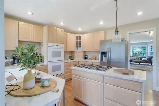 Kitchen with double oven and 5 burner propane stove top