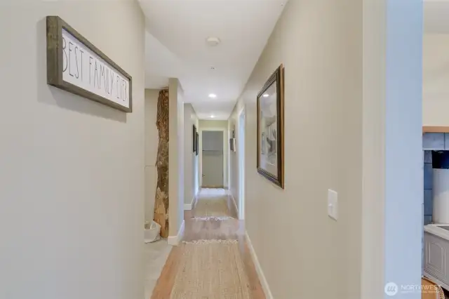 Hall way to bedrooms, den, laundry and garage.