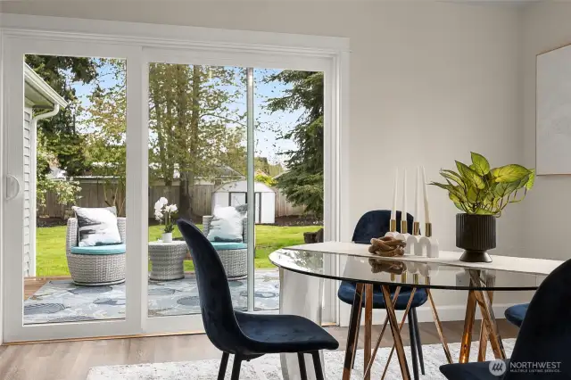 Extra large dining room with slider leading out to deck