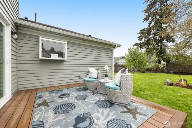 Back deck overlooking the expansive back yard a great place to sit and watch the hot air balloons or skydivers in summer