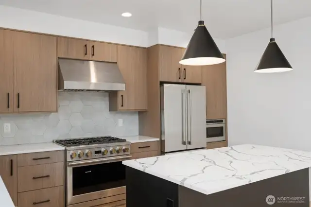 Sharp looking and very functional kitchen with room for stools at the bar