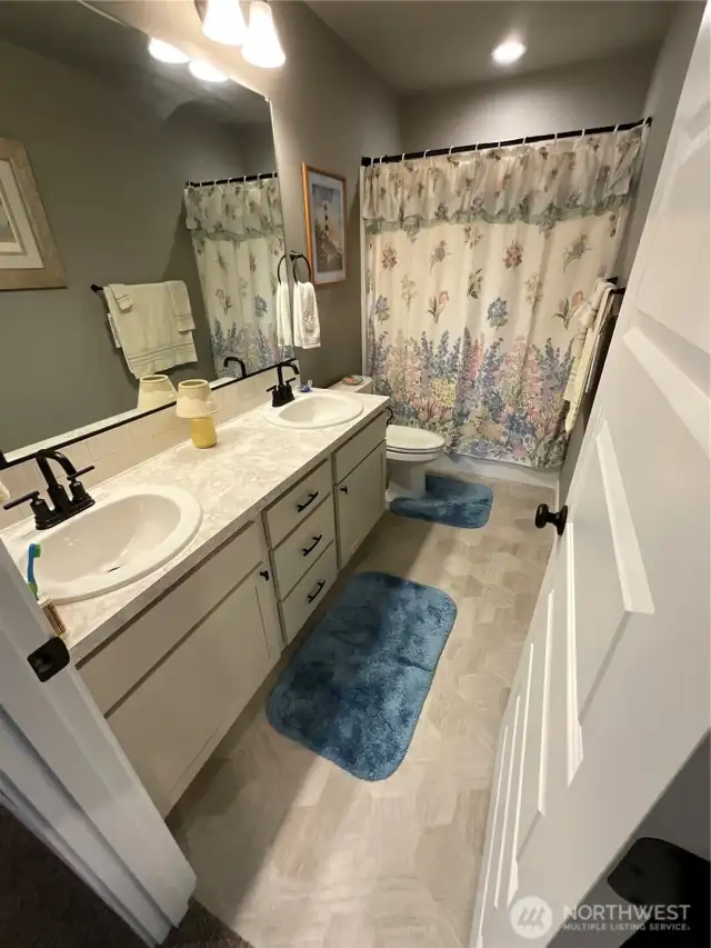 Guest bath on upper level.