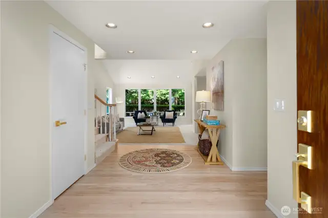 Enter to a bright foyer that brings you to the living room or the hall to the kitchen/ family room.