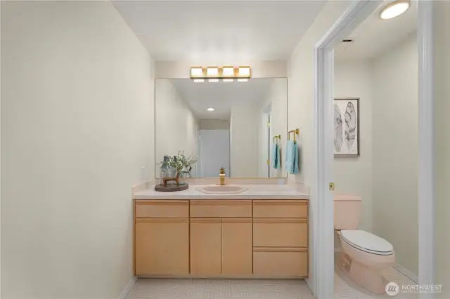 Upper level main bath with tub and shower combo.