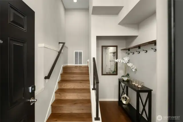Gleaming hardwoods and spot for a shoe rack greet you upon entry