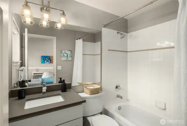 Full guest bath is stylishly updated