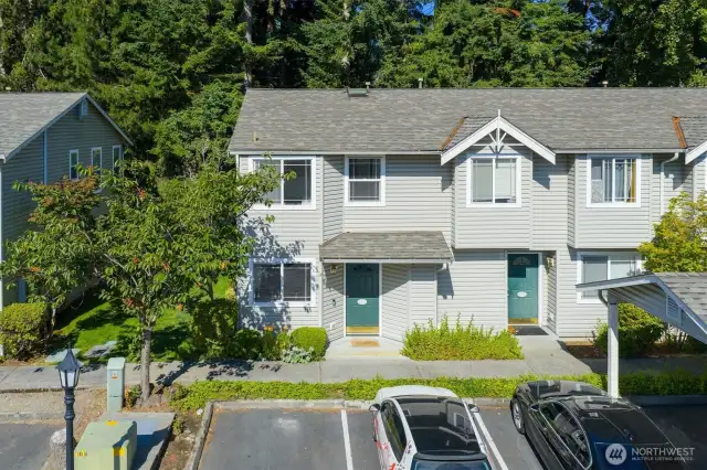 Unit #1, private corner lot, with 1 assigned carport parking, Space #65.