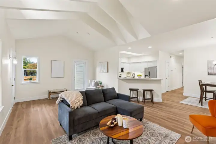New vinyl plank flooring and natural light.