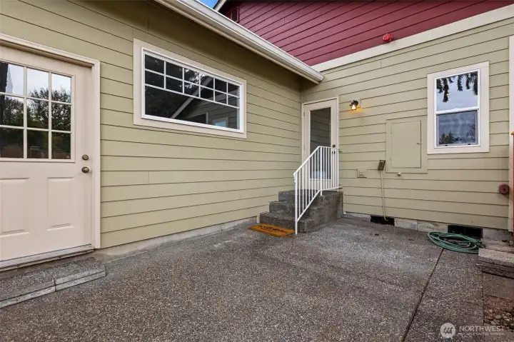 Enjoy outdoor dining on your private fenced patio. With a door to access the garage.