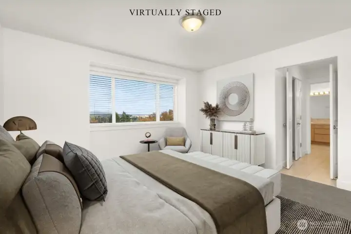 Primary Suite: 5-piece bath and two walk-in closets