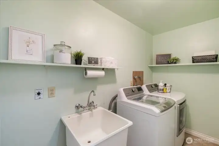 Spacious utility room conveniently located on main floor