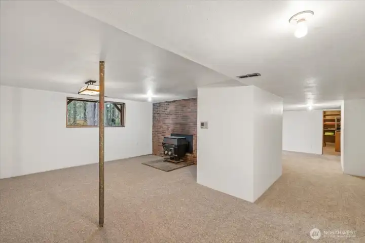 Family room with cozy free standing fireplace