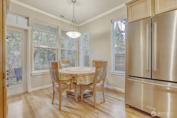Beautiful stainless steel appliances, gas range. Dining room looks out into the nature preserve.