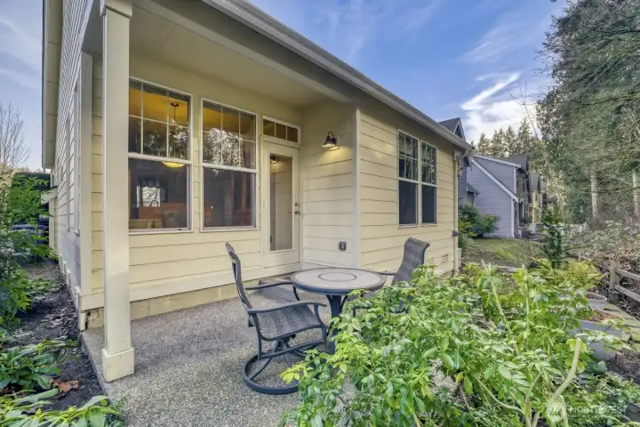 Serene back porch connecting to the nature preserve. Peaceful living. Watch the birds, enjoy the sunshine and more.
