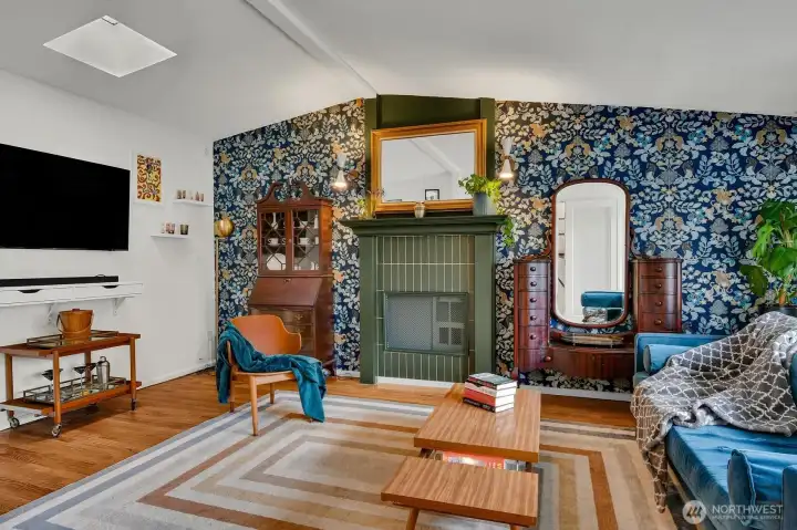 Cosy living room with vaulted ceilings.