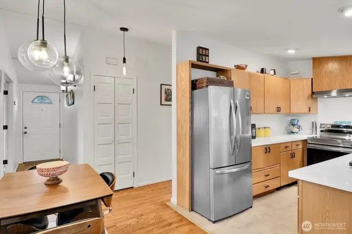 Front door at left and hall closet has the double doors