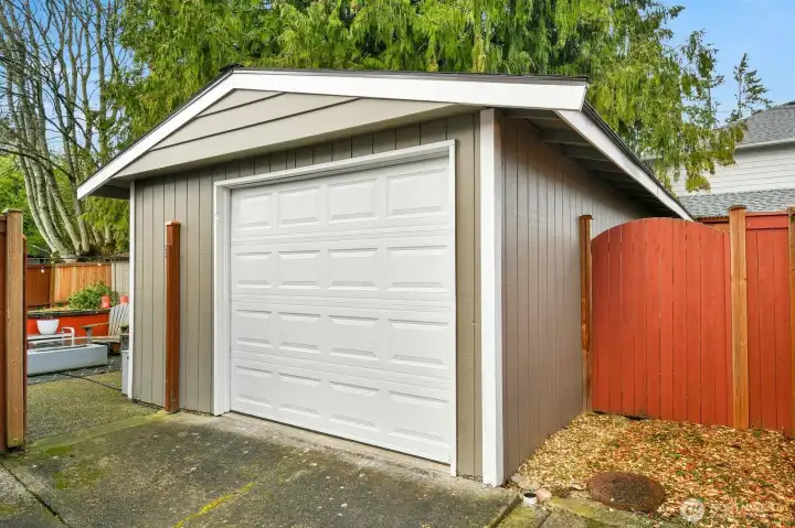 Detached oversized 1 car garage can hold 2 cars if you park them tandem style.