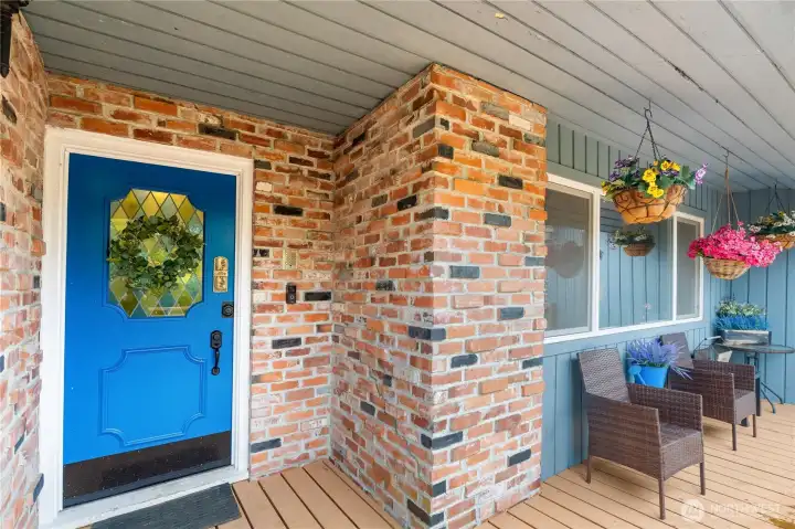 Beautiful brickwork on front of home and bright blue door, so pretty!