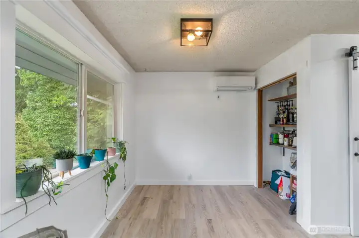 Space for a table & storage closet in kitchen