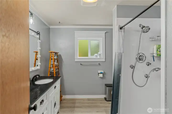 Lower level 3/4 bath with double vanity & mirrors