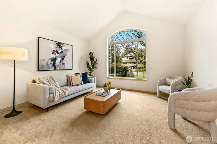 Generous living spaces are filled with natural light, creating an inviting setting that feels both expansive and comfortable.