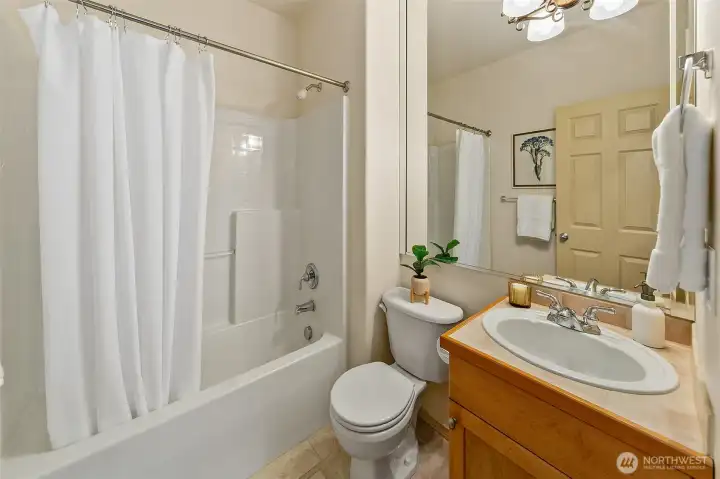 Convenient main-level bath supports guests and everyday use without disrupting the flow of the home.