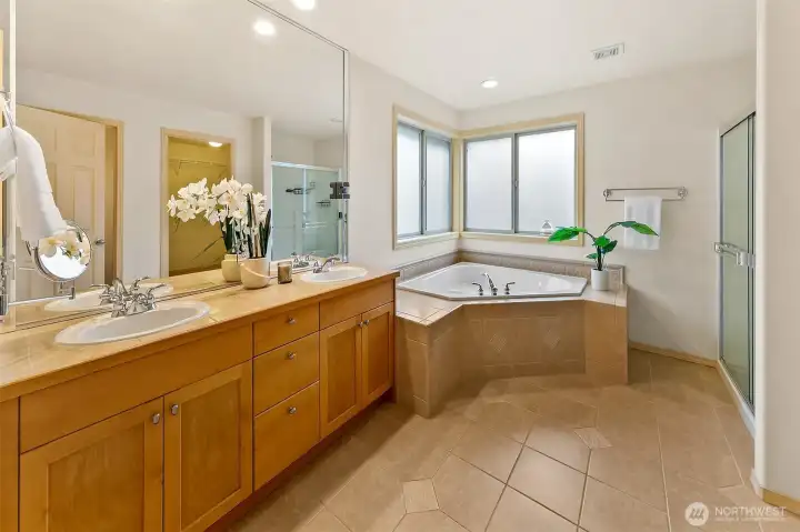 Five-piece spa-style primary bath designed for both function and relaxation, supporting daily routines with ease.