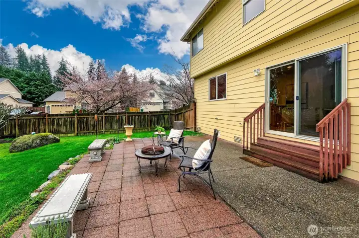 Side yard enhances circulation and usability across the fully fenced property.