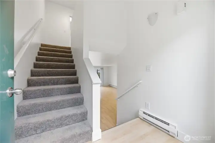 Split level entry with bedroom upstairs and main living downstairs.