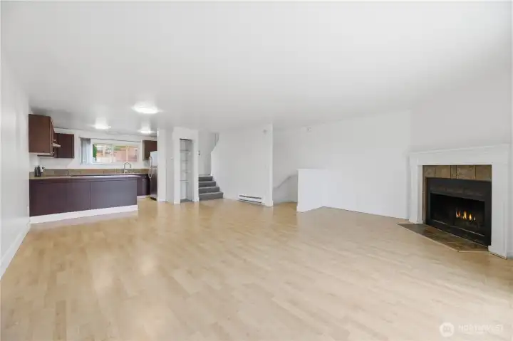 This multi-level gem welcomes you with a cozy fireplace in the living room, a delightful dining area with light toned flooring throughout.