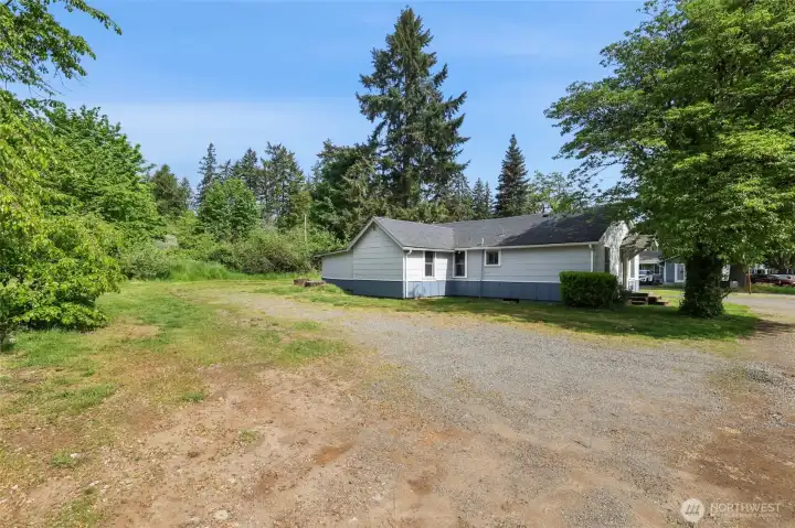 Left side of the home and front.