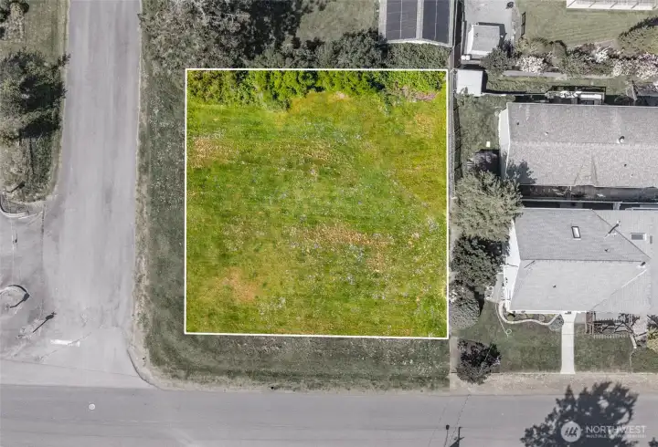 This is actually two distinct parcels that two homes could be built on, as seen on the adjacent lots that were sold by cousins of the owner. Or place a larger home on both parcels--the choice would be yours.