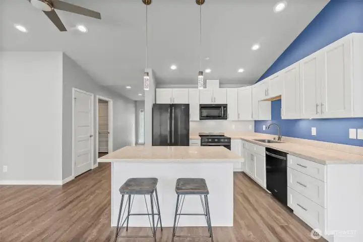 Beautiful kitchen with canned lighting and decorative accent lighting