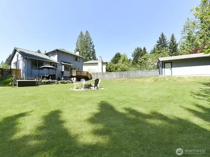Just shy of 1/2 acre. 24x24 Detached shop.