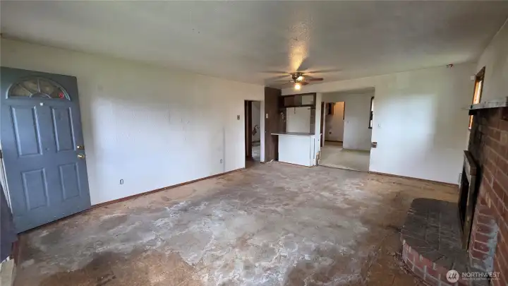 Natural light pours in from 3 living room windows
