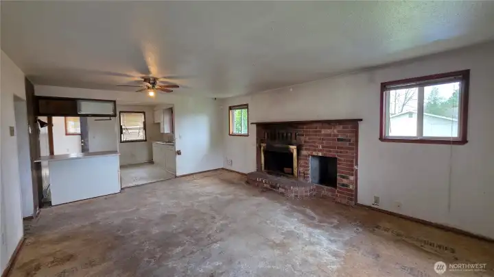 Living room is open to the kitchen offering potential for a great room