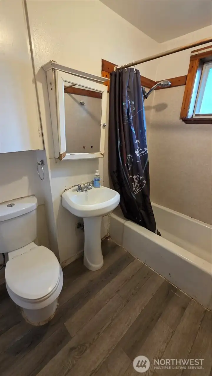 Linen cupboard above toilet for storage