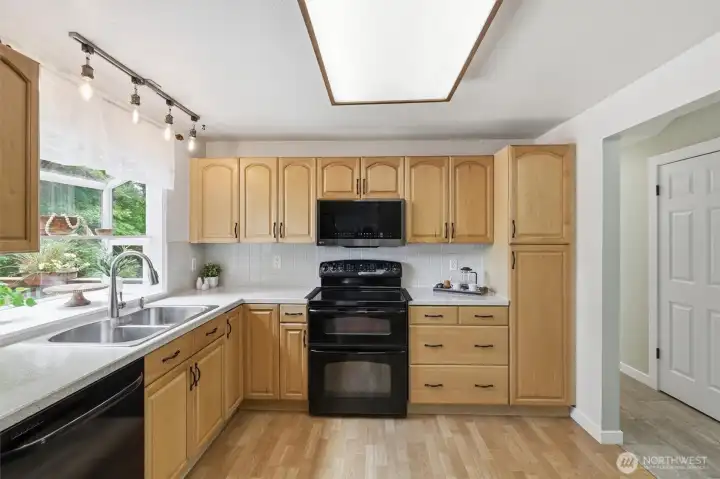 Warm Maple cabinets with plenty of storage