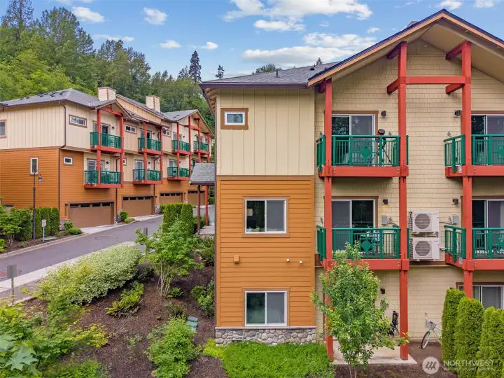 Back of Home with Two Balconies and Patio