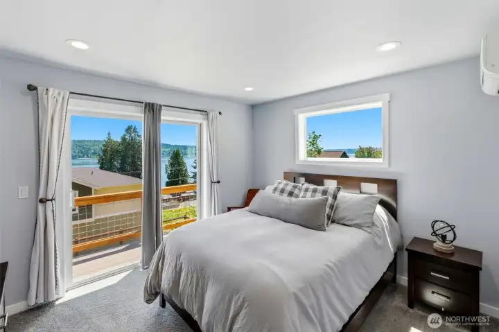 Bedroom #2 with slider to balcony with water & Mt. Rainier views and walk-in closet! Bedroom #2 with slider to balcony with water & Mt. Rainier views and walk-in closet!