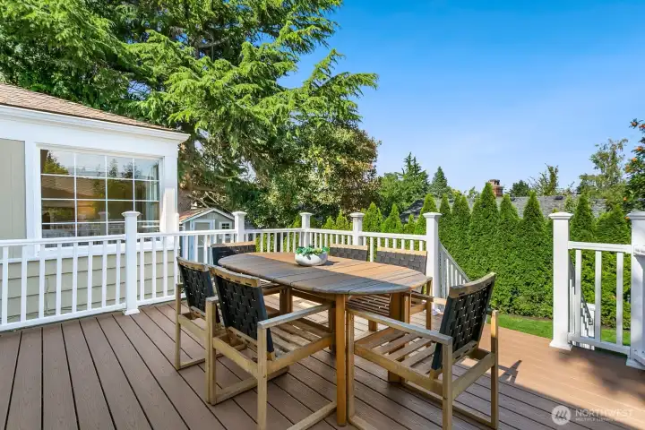 The deck off the kitchen was rebuilt in 2018-19 and overlooks the backyard.