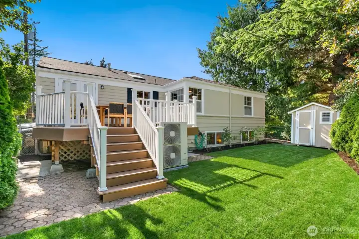 The adorable yard is fully fenced and was re-sodded in June.